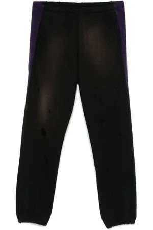 Pins & Needles Distressed track pants