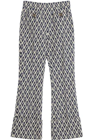 VALENTINO GARAVANI Monogram-print trousers