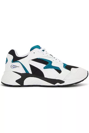 PUMA Prevail Sneakers in White