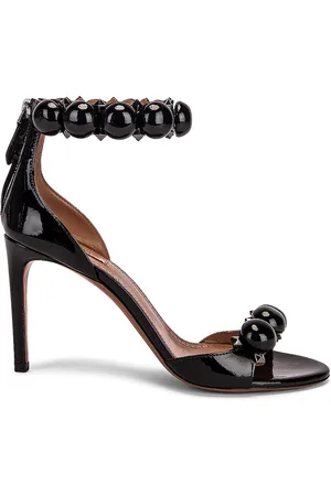 Alaïa La Bombe Ankle Bracelet Sandals in Black