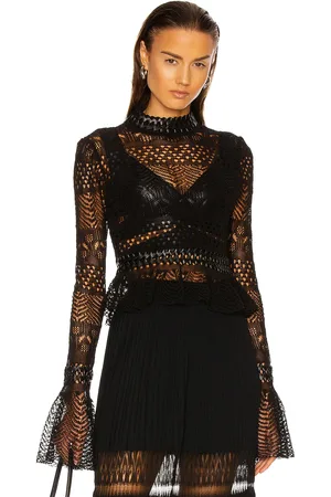 Alaïa Fitted Long Sleeve Top in Black