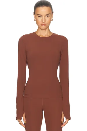 YEAR OF OURS Studio Long Sleeve Top in Brown