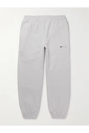 McQ Men Trousers - Tapered Logo-Appliquéd Cotton-Jersey Sweatpants