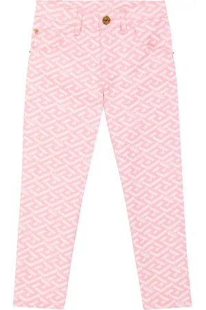 VERSACE La Greca printed jeans