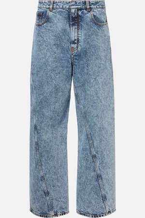 Alaïa AlaÃ¯a Twisted low-rise wide-leg jeans