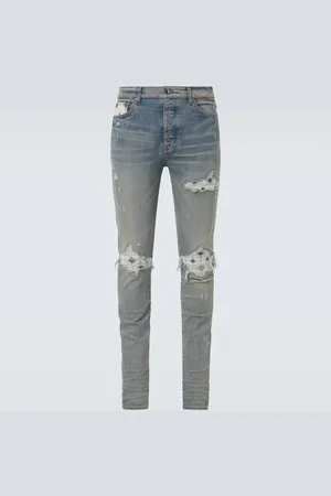 AMIRI Micro Starburst distressed skinny jeans